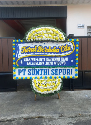 Papan Bunga Duka di Uwung Jaya