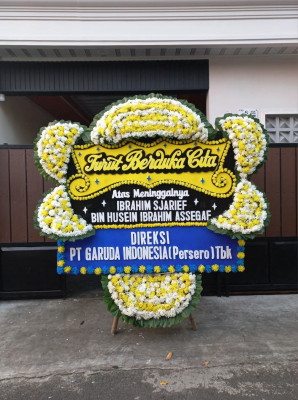 Papan Bunga Duka di Uwung Jaya