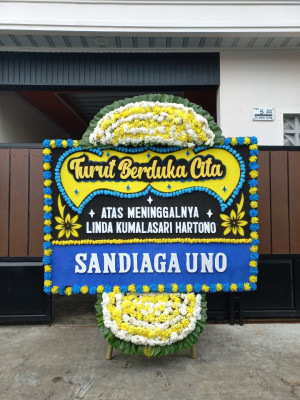 Papan Bunga Duka di Uwung Jaya