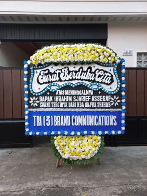 Papan Bunga Duka di Uwung Jaya